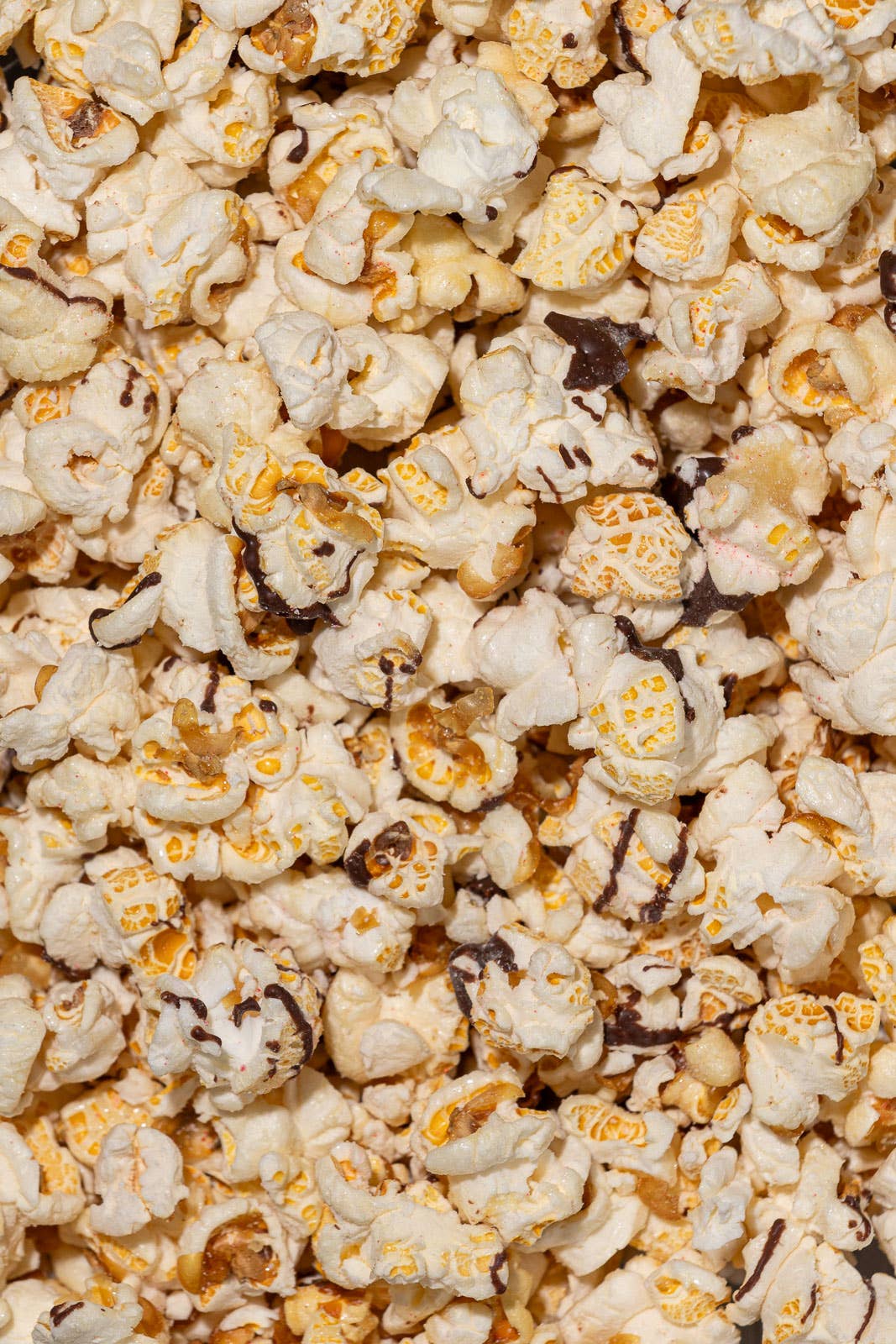 Candy Cane Crunch Chocolate Drizzled Popcorn