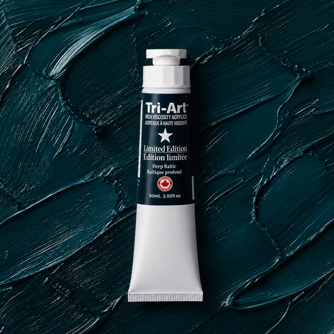 A tube of Tri-Art Deep Baltic acrylic paint stands upright against a textured, dark navy background made of thick paint strokes.