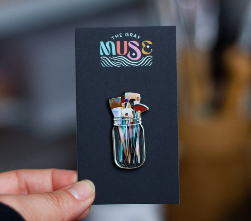 The Gray Muse Paint Brushes in Clear Jar Enamel Pin - Art Noise