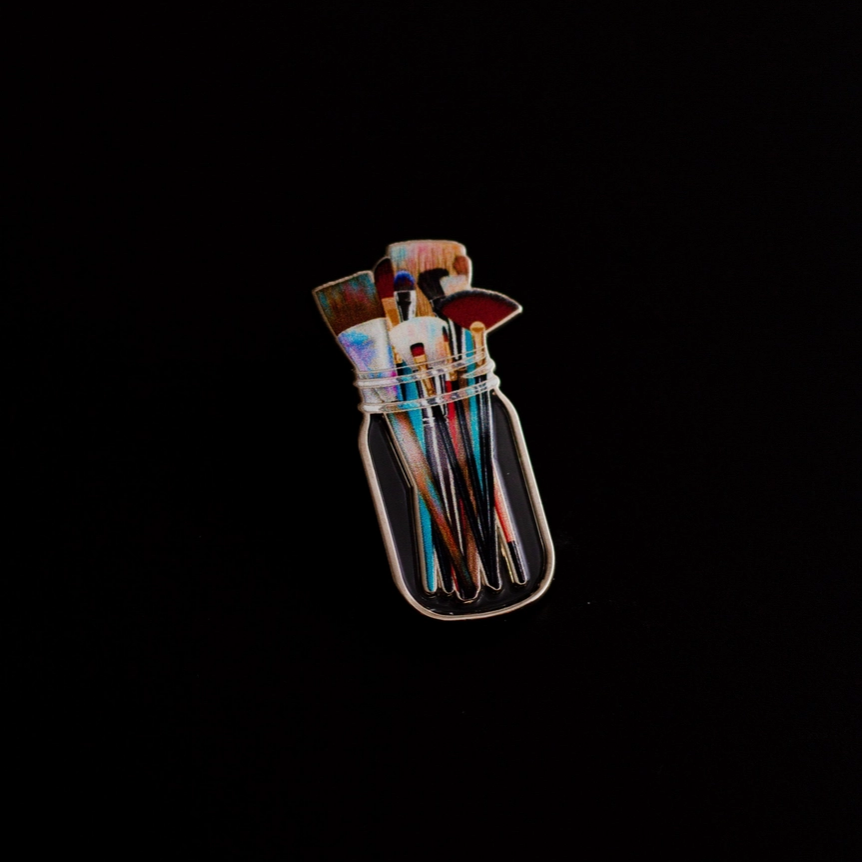 The Gray Muse Paint Brushes in Clear Jar Enamel Pin - Art Noise