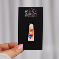 The Gray Muse Rainbow Watercolor Paint Tube Enamel Pin - Art Noise