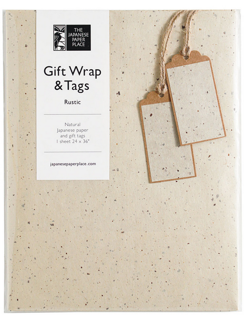 Natural Japanese wrapping paper with rustic texture and two matching gift tags on neutral background