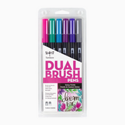 Set of 6 Tombow Dual Brush Pens in galaxy colours including purple, turquoise, green, and rhodamine red arranged together