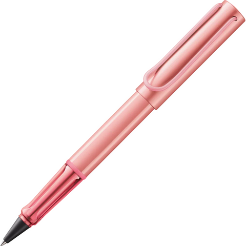 Pink pen on a white background