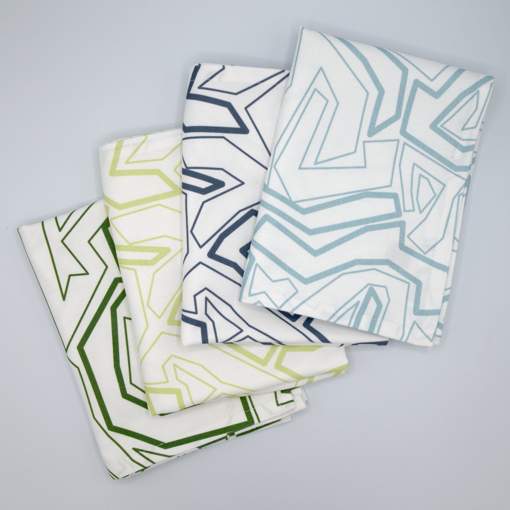 Colourful Squiggles tea towels featuring playful printed designs in multiple colours