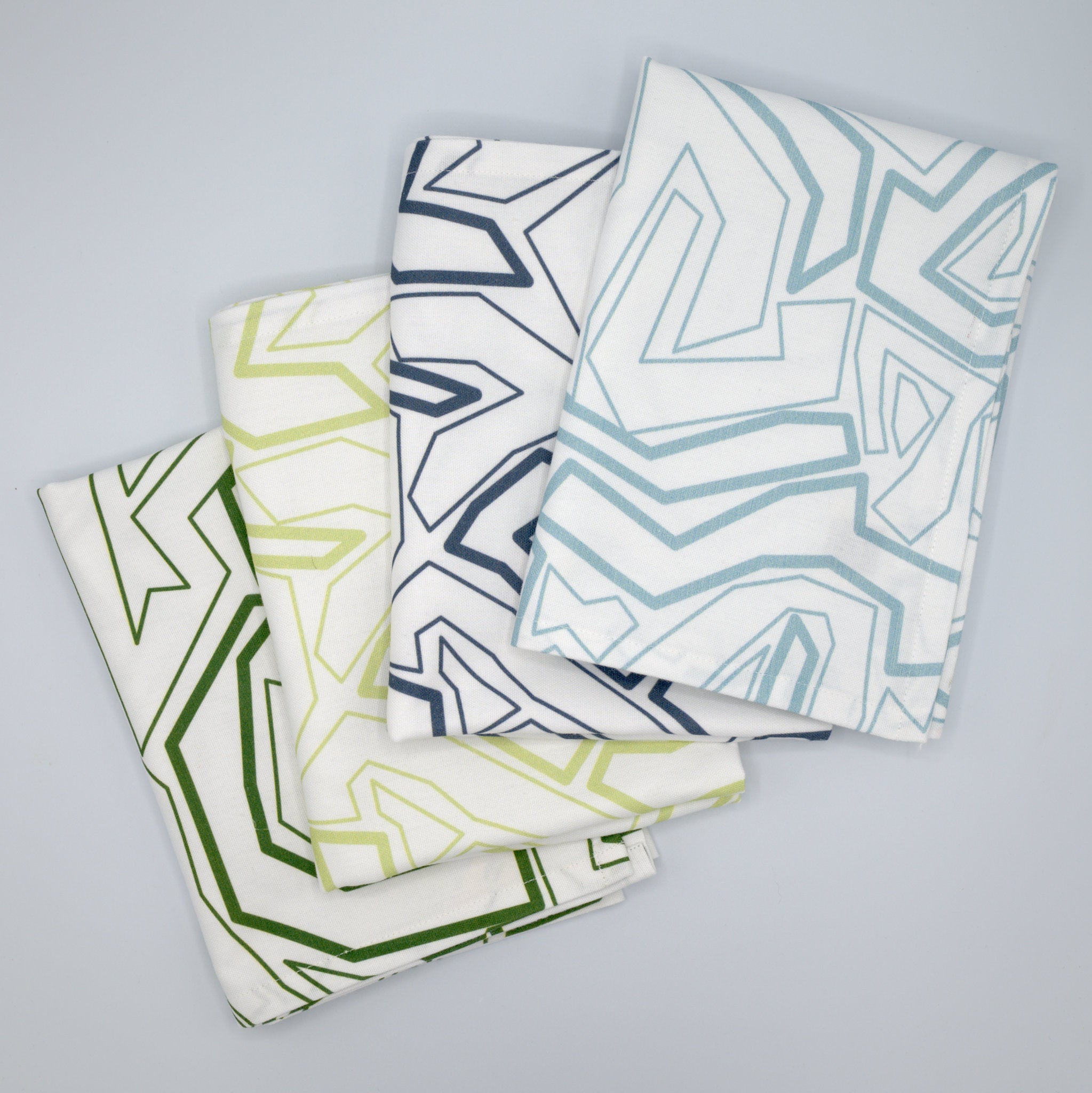 Colourful Squiggles tea towels featuring playful printed designs in multiple colours