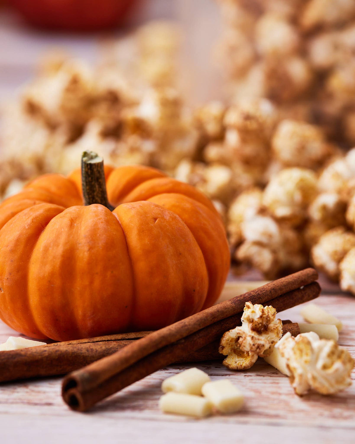 Pumpkin Spice & White Chocolate Drizzled Popcorn